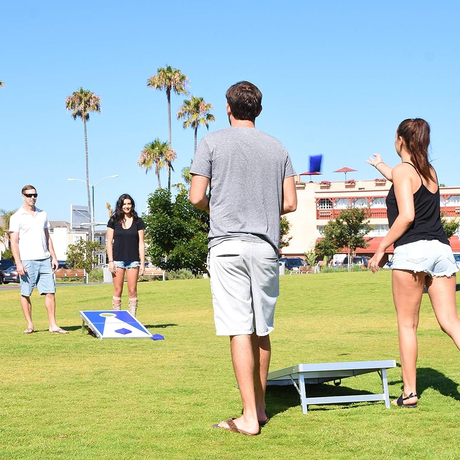 GoSports 4 x 2 ft Ultra Portable Cornhole Board Set – Choose LED Lights or Standard – Regulation Size Corn Hole Games for Adults, Perfect for Tailgating and Camping – Includes 8 Bean Bags & Rules(Red & Blue Edition)